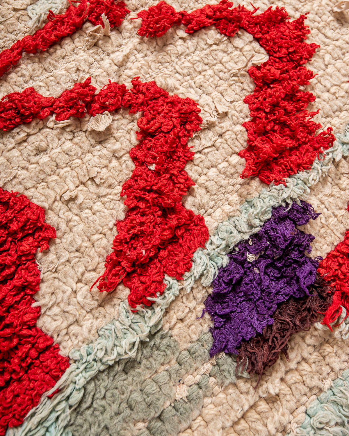 Modern designer vintage handcrafted Berber rug from Morocco. Boucherouite runner rug with beautiful colors and patterns.